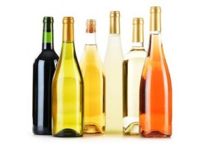 Composition with variety of wine bottles isolated on white