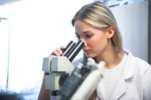 researcher with microscope