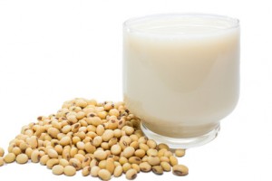 Soybeans and soy milk in a glass